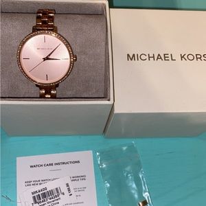 Michael kora rose gold watch
